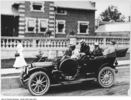 Original title:  Sir Henry Pellatt (right) and group in car. 1909. City of Toronto Archives, Fonds 1244, Item 4011, William James family fonds. Photograph taken in front of the Hunting Lodge on the Casa Loma grounds, which was the Pellatts' home while Casa Loma was under construction.