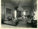 Original title:  Image from Hamilton Public Library, Local History and Archives.
Wesanford, drawing room, after 1917. On the left of the hall is the drawing room, a vision of ivory and gold in Louis XIV style. It is a large room, about 40x25 feet, with a high ceiling that sets off the pretty scheme of decoration to advantage. The walls are of ivory enamel picked out with gold leaf with delicate rose pink satin panels woven in delicately intricate designs. Along the upper edge are jolly little Cupids engaged in the pretty vagaries that seem to constitute their mission in life. The mantel is composed of large slabs of Mexican onyx... The woodwork of the furniture is white and gold, upholstered in brown and gold. One of the largest make of Steinway pianos stands on one side.  Hamilton Spectator, June 8, 1892.