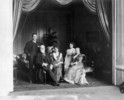 Original title:  A family group: Miss Margaret Gibson, Miss Eugenia Gibson, Sir John M. Gibson, Lady Gibson and Mr. Hope Gibson. 